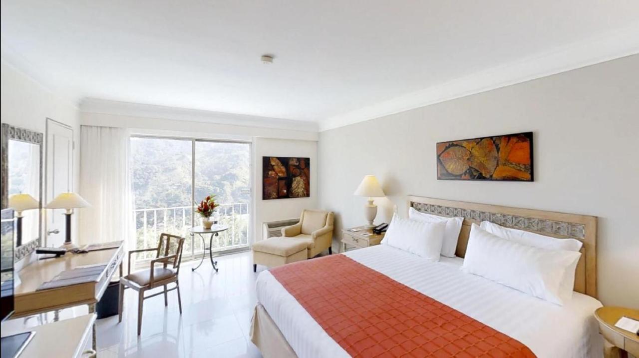 Hotel Estelar Altamira Ibagué Екстериор снимка A room at the hotel