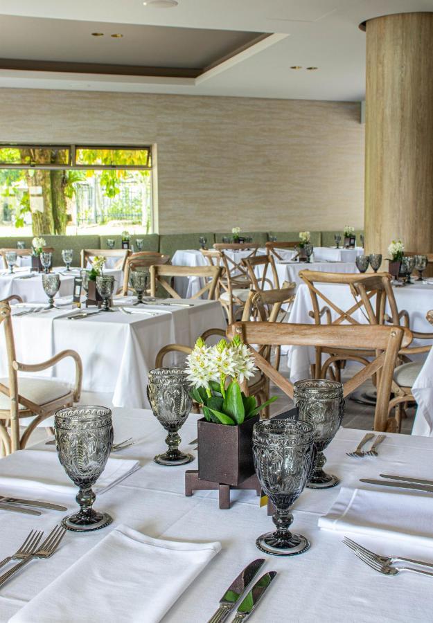Hotel Estelar Altamira Ibagué Екстериор снимка The interior of the restaurant